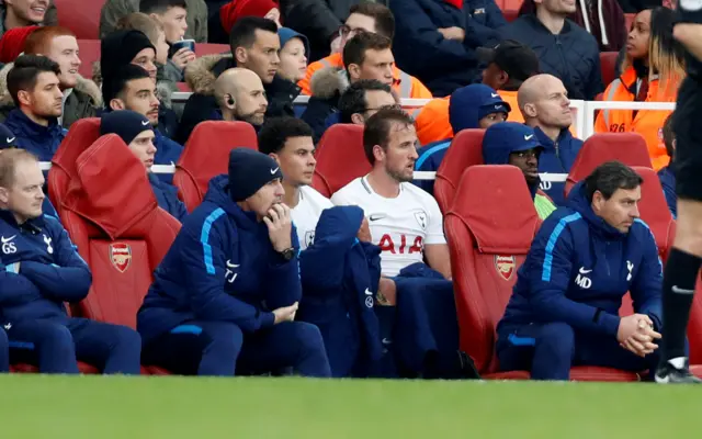 Harry Kane sits on the bench