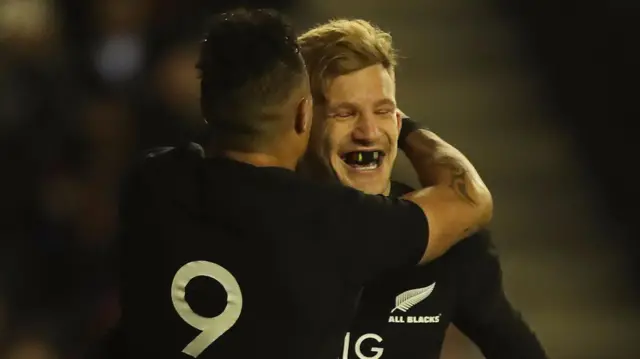 Damian McKenzie celebrates