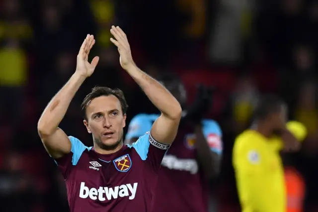 Mark Noble applauds