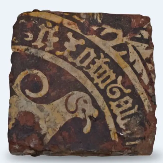 The medieval tile with image of a dog