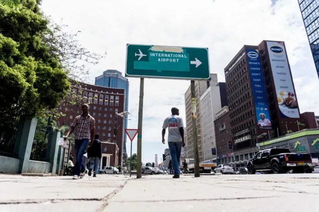 Mugabe airport sign