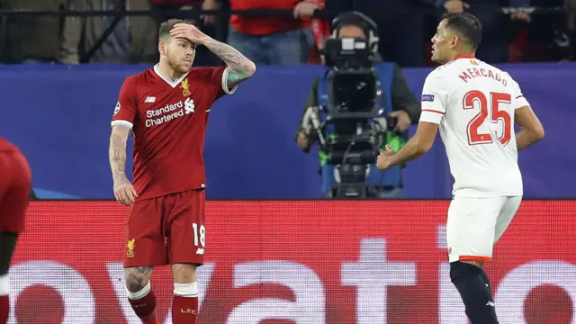 Alberto Moreno of Liverpool reacts