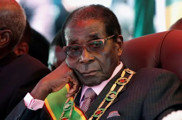 President Robert Mugabe looks on during a rally marking Zimbabwe"s 32nd independence anniversary celebrations in Harare, Zimbabwe April 18, 2012.