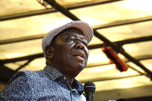 Zimbabwean opposition and Movement for Democratic Change (MDC) leader Morgan Tsvangirai addresses a crowd of protesters outside the Zimbabwean parliament on November 21, 2017 in Harare.