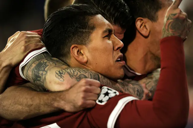 Roberto Firmino celebrates