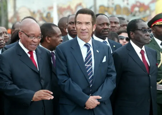 South Africa President Jacob Zuma, Botswana President Ian Khama and Zimbabwean President Robert Mugabe stand on October 19, 2011 at the Mozambican heroes memorial in Maputo. Mozambican Armando Guebuza was to unveil a statue of independence hero Samora Machel on the 25th anniversary of his death in a plane crash at a ceremony attended by presidents of Brazil, South Africa, and Zimbabwe