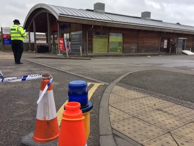 Police at Tesco Express, in Hinckley