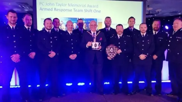 The police unit getting their award