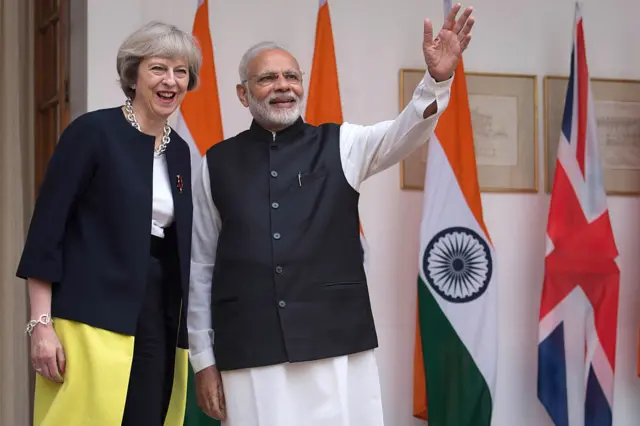 Theresa May and Narendra Modi