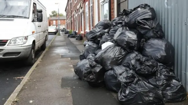 Rubbish piled high in Birmingham