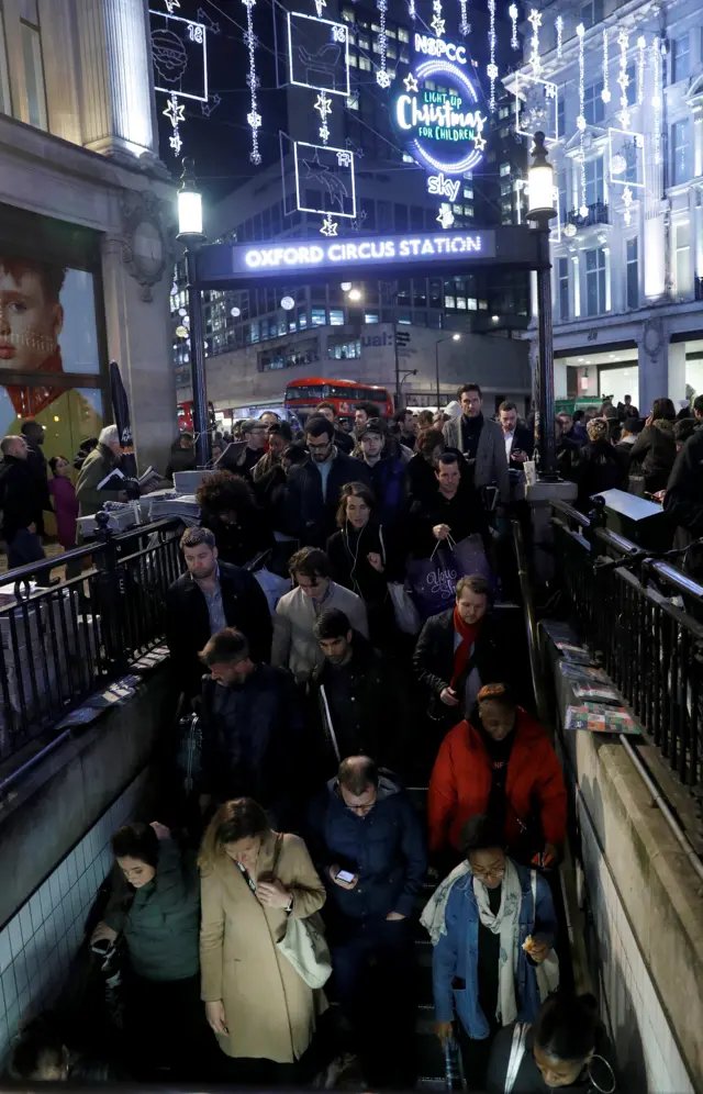 People going into the Tube