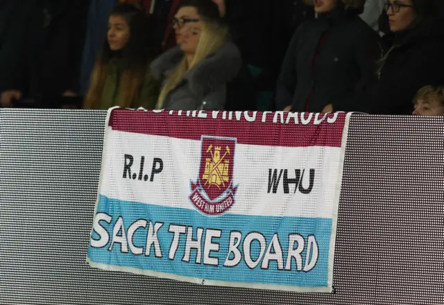 A banner made by West Ham fans reading "sack the board".