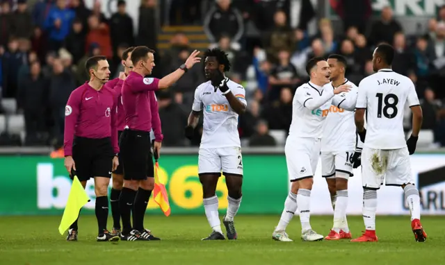 Wilfried Bony remonstrates with referee Stuart Attwell