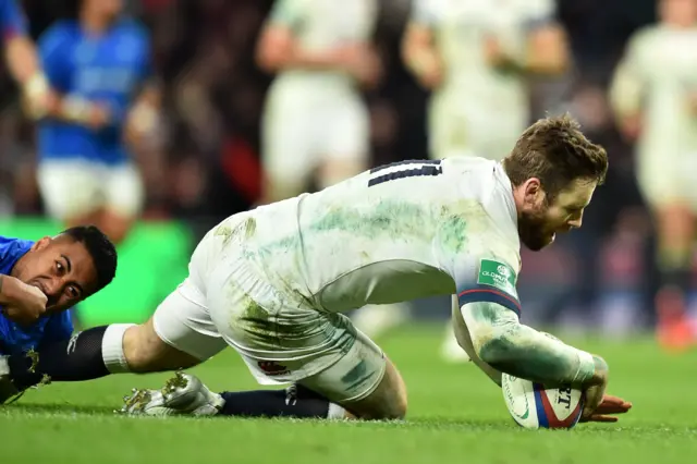 Daly scores a try for England