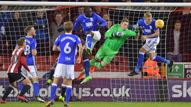 David Stockdale punches clear