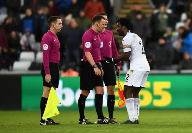 Swansea City's Wilfried Bony remonstrates with referee Stuart Attwell