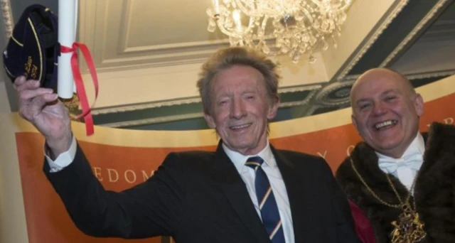 Denis Law celebrates in Aberdeen