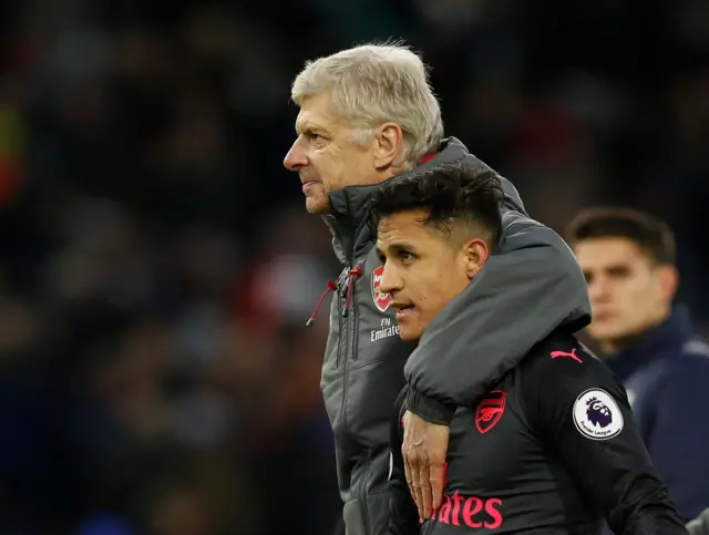 Arsenal Wenger hugs Alexis Sanchez at full-time