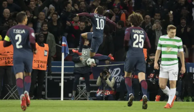 Neymar celebrates the second of his two goals against Celtic in Paris