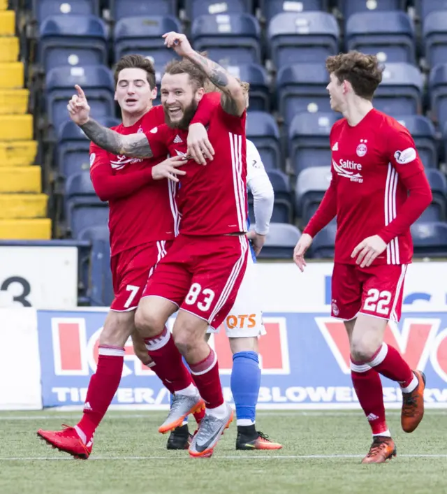 Aberdeen's Stevie May (centre) celebrates