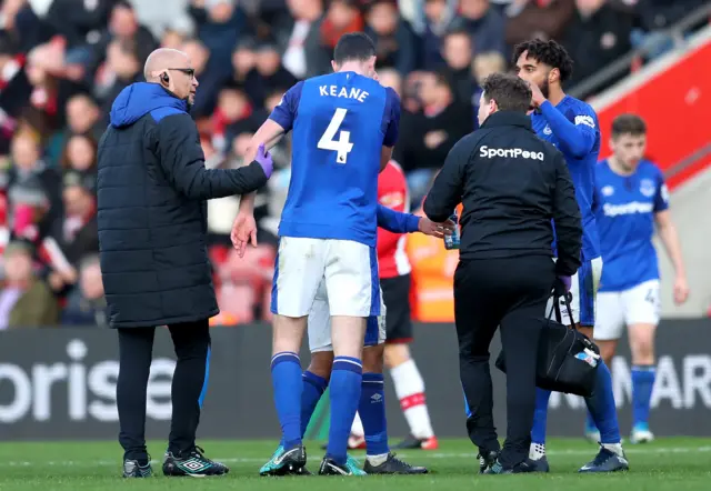 Michael Keane limps off for Nikola Vlasic