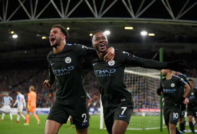 Raheem Sterling and Kyle Walker celebrate