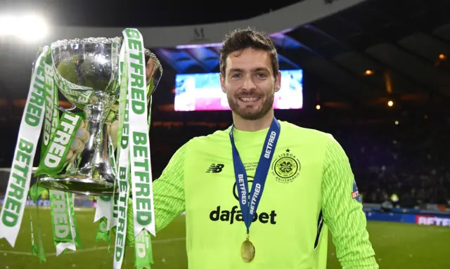 Craig Gordon with his hands on the cup