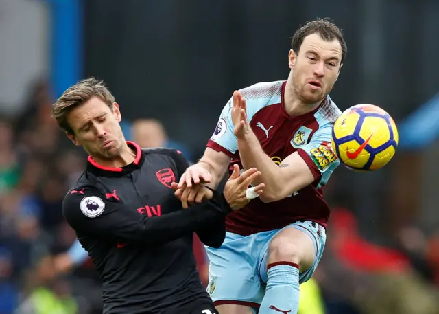 Burnley's Ashley Barnes challenges Arsenal's Nacho Monreal