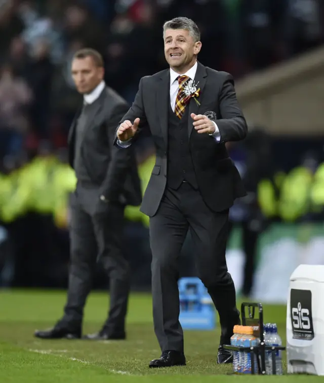 Motherwell manager Stephen Robinson urges his team on