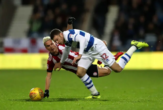 QPR's Jamie Mackie (right) and Brentford"s Sergi Canos