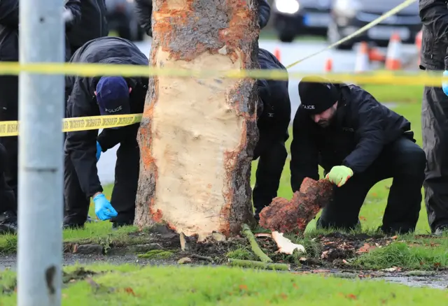 Forensics officers at scene