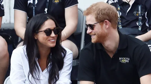 Britain"s Prince Harry and his girlfriend actress Meghan Markle watch the wheelchair tennis event during the Invictus Games in Toronto, Ontario, Canada September 25, 2017