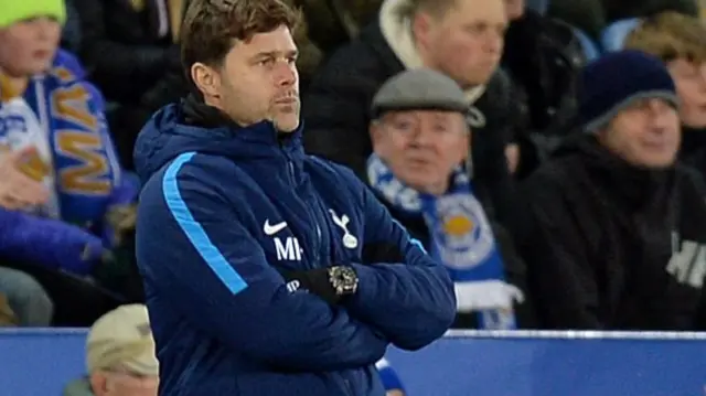 Tottenham Boss Mauricio Pochettino watches on as his side trail Leicester