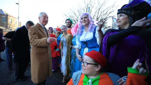 The Prince of Wales meeting pantomime actors at the Potteries Museum