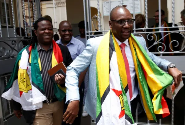 Pastor Evan Mawarire leaves the High Court after he was found not guilty of subversion in Harare, Zimbabwe, November 29, 2017.