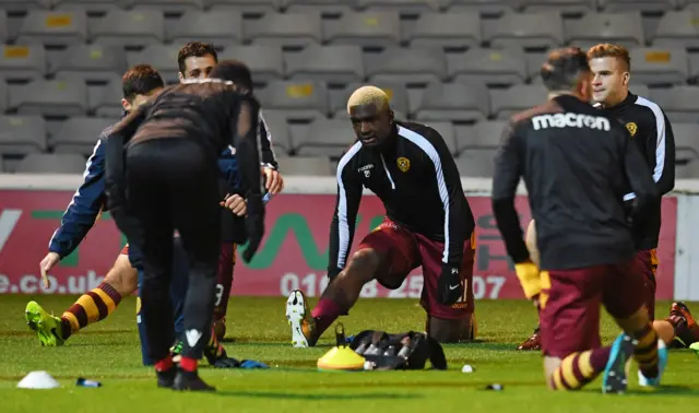 Motherwell's Cedric Kipre (centre) warms up at Fir Park