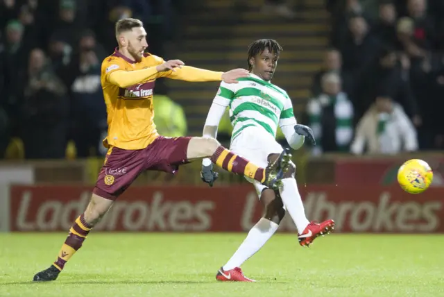 Louis Moult and Dedryck Boyata tussle for possession