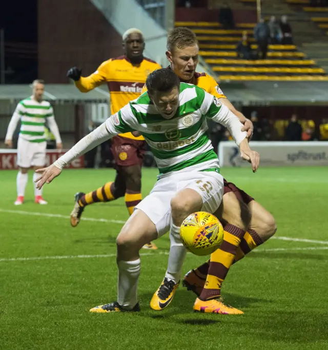 Motherwell's Andy Rose fouls Callum McGregor in the box