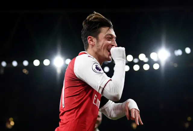 Mesut Ozil celebrates