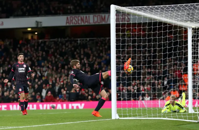 Martin Cranie clears a shot off the line