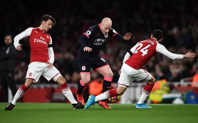 Aaron Mooy and Mesut Ozil