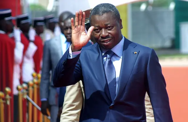 This file photo taken on April 25, 2016 shows Togolese President Faure Gnassingbe waving as he arrives to inaugurate the new Gnassinge Eyadema International airport terminal in Lome.