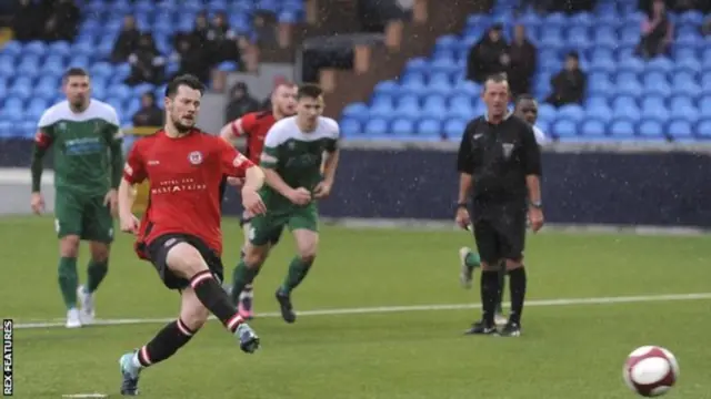 Hyde United take a penalty