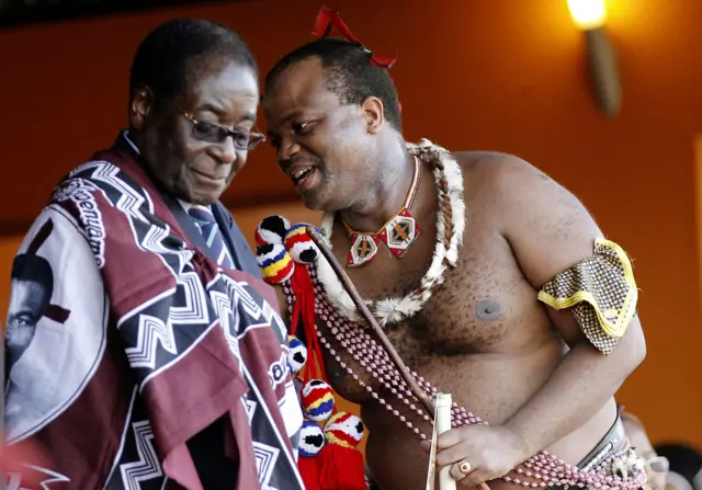 Robert Mugabe and King Mswati III