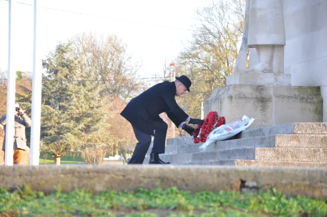 Colin Vaudin laying a wreath