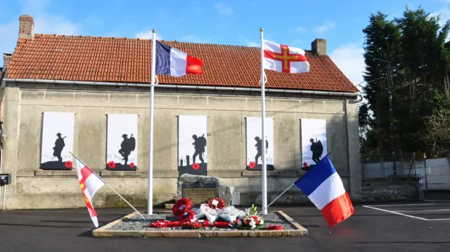 Memorial stone and flags