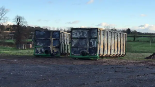 The burnt out containers