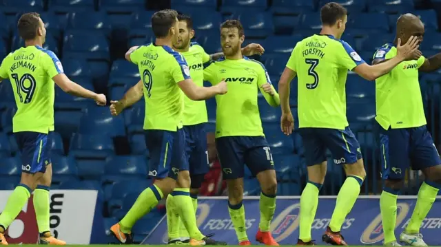 Derby celebrate a goal against Leeds