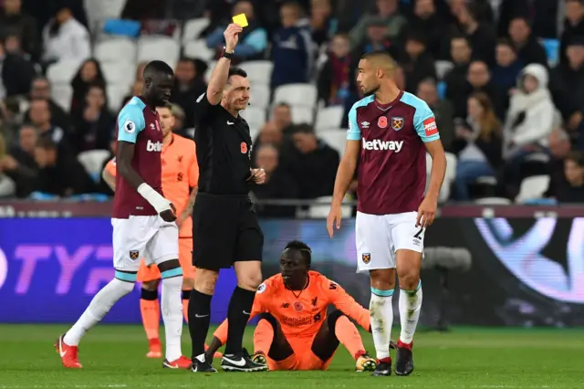 Winston Reid of West Ham is booked