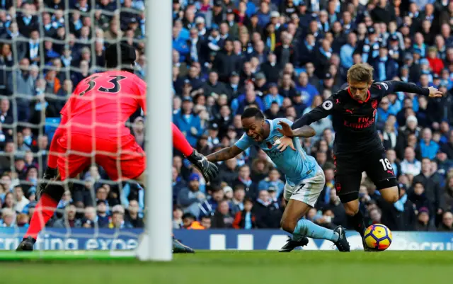 Raheem Sterling and Nacho Monreal